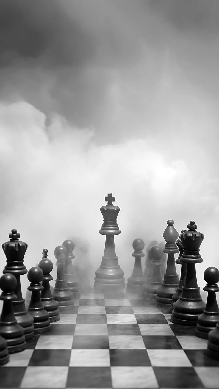 Chess board and pieces in a field of mist
